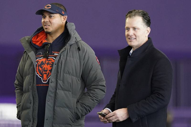 Chicago Bears general manager Ryan Poles (left) and head coach Matt Eberflus watch during Northwestern's Pro Day, Tuesday, March 14, 2023, in Evanston.