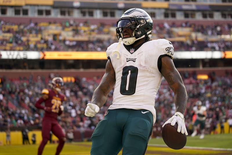 Philadelphia Eagles running back D'Andre Swift scores a touchdown against the Washington Commanders during the second half of an NFL football game, Sunday, Oct. 29, 2023, in Landover, Md.