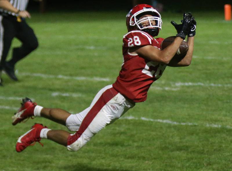 Hall's Deanthony Weatherspoon makes a catch against Illinois Valley Central but was called back due to a holding call on Friday, Sept. 29, 2023 at Richard Nesti Stadium.