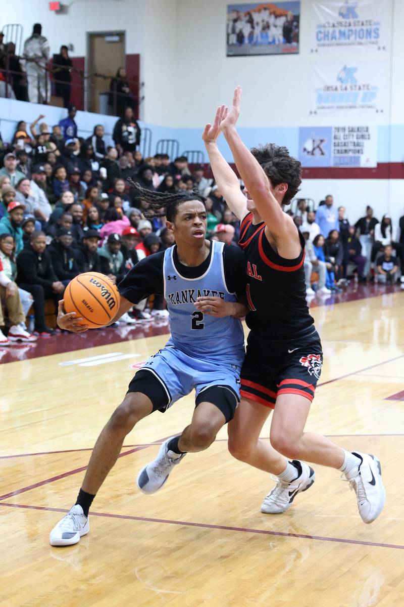 Kankakee's Kenaz Jackson drives to the lane during the Kays' 54-50 victory over Lincoln-Way Central in the 75th Kankakee Holiday Tournament maroon bracket championship on Sunday, Dec. 28, 2025.