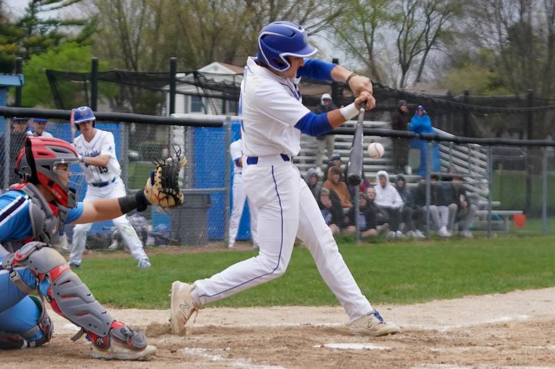 Geneva’s Sawyer Venditti (12) drives in a run against Lake Park during a baseball game at Geneva High School on Wednesday, April 17, 2024.