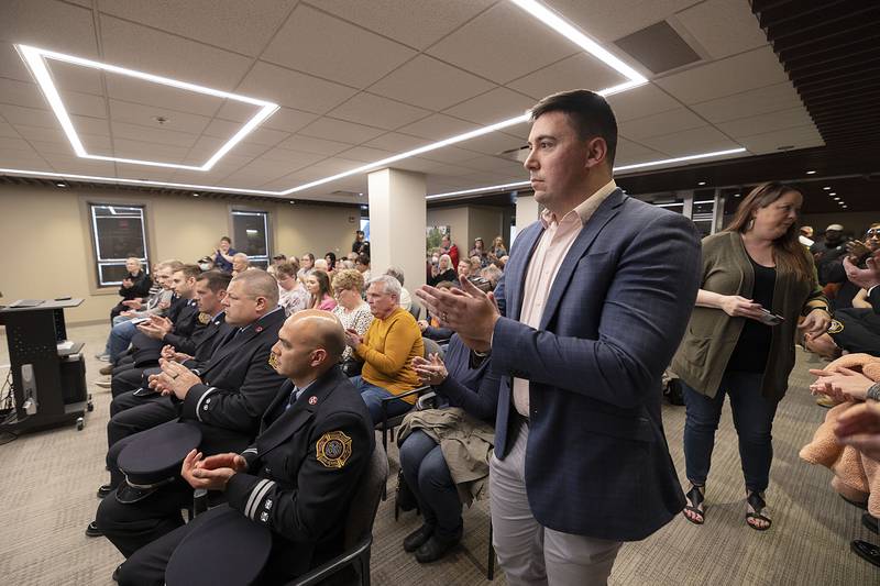 Newly sworn in alderman Joe Strabala-Bright applauds the swearing in of new mayor Diana Merdian Monday, May 1, 2023 at Sterling’s City Council meeting.