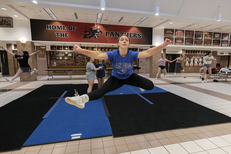 Kate McConnell practices with her Erie-Prophetstown competitive cheer squad Wednesday, Jan. 18, 2023 at Erie High School. The team is gearing up for sectionals on Jan. 28, 2023.