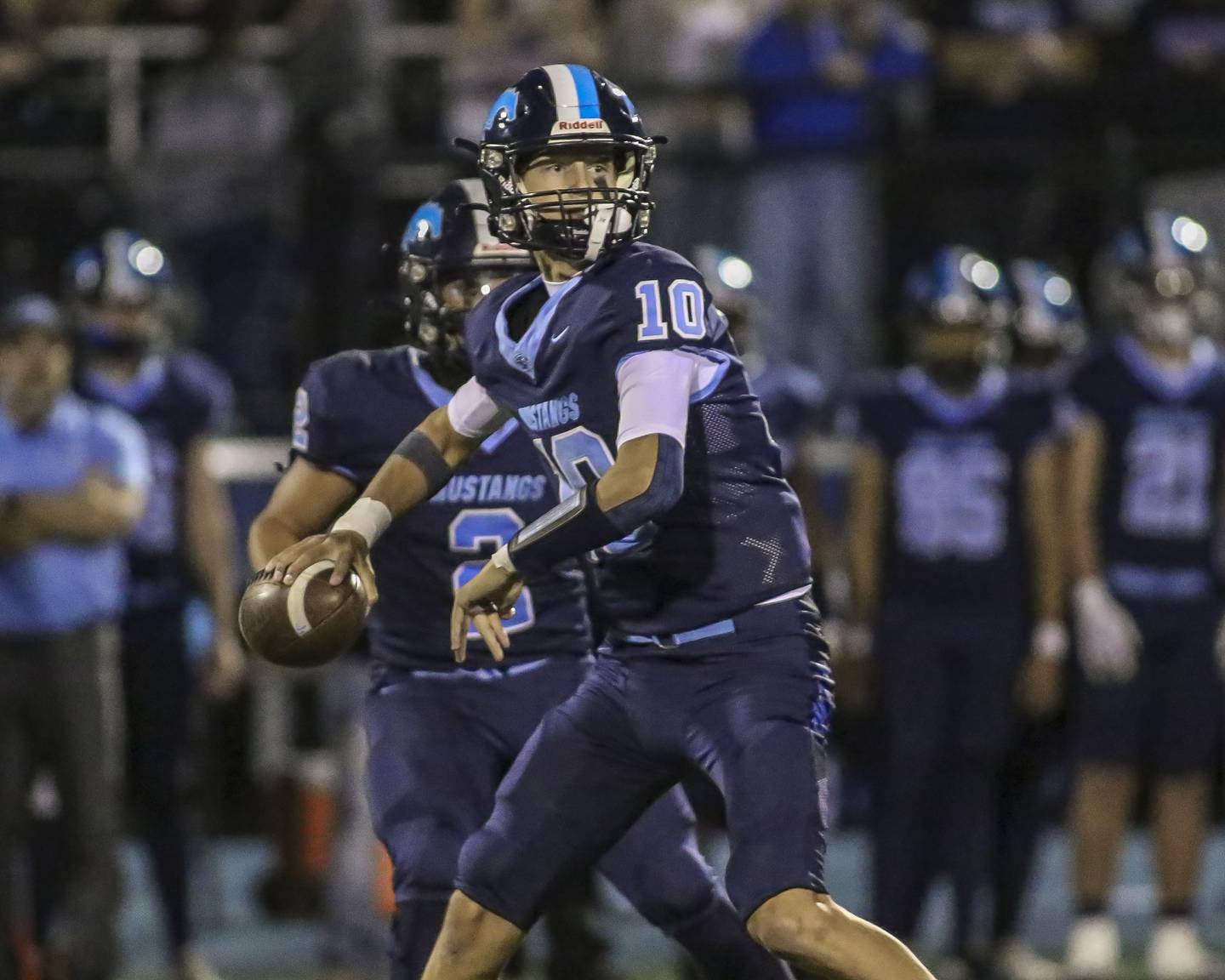 Downers Grove South's James Sobkowiak (10) drops back to pass during football game between Downers Grove North at Downers Grove South Friday, Sept 5, 2025  in Downers Grove.