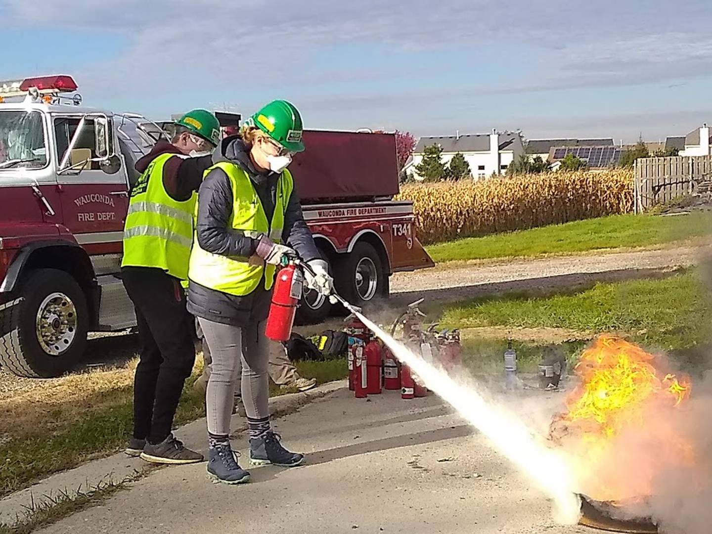 Members of Wauconda's Community Response Emergency Training Team practice fire suppression during the six-week class offered in Oct. 19, 2019.
