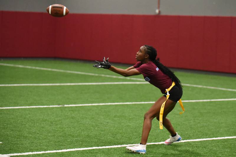 Kankakee's Jasiah Hawkins looks to haul in a pass during flag football practice Wednesday, Aug. 13, 2025.