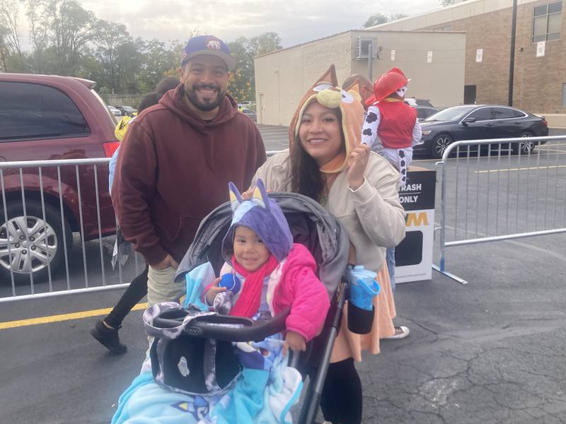 A family dressed as characters from Bluey at the Joliet Police Department's Trunk-or-Treat event. 
Saturday, Oct. 25, 2025.