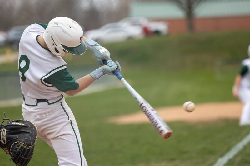Geno Dinges (9) of St. Bede hits ball on Thursday, April 10, 2025 at St. Bede High School in Peru.