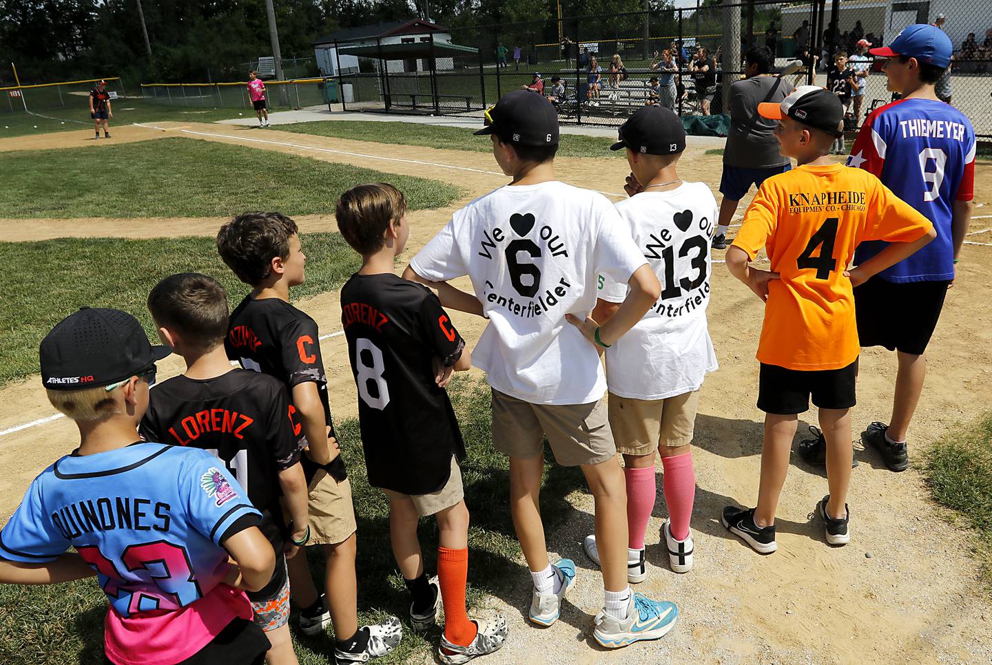 Players line up to bat during a celebration of life Wiffle ball game in memory of Alan Kroll on Monday, June 30, 2025, at the McHenry VFW. Alan, 11, was killed in a June 23 crash near Marengo. Over 50, kids of all ages to part in the game to have fun in his memory.