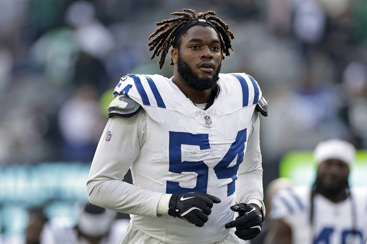 Indianapolis Colts defensive end Dayo Odeyingbo (54) runs off the field during an NFL football game against the New York Jets Sunday, Nov. 17, 2024, in East Rutherford, N.J. The Colts won 28-27. (AP Photo/Adam Hunger)