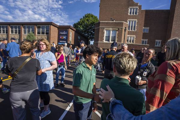 Minneapolis police: shooting at Catholic school has left 3 dead, including shooter, and 17 injured