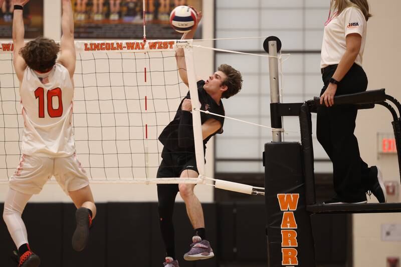 Lincoln-Way West’s Connor Studer powers a shot against Plainfield East on Wednesday, March 22nd. 2023 in New Lenox.