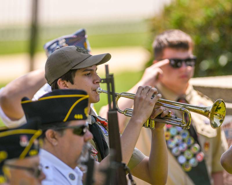 Christian Dominguez plays taps during the Memorial Day event on Monday May 25, 2026, held at Town Square Park in Yorkville.