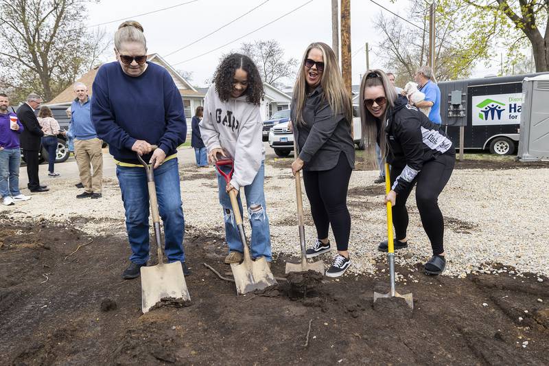 Dixon Habitat for Humanity homeowner Nichole Richardt (second from right) with mom Janie Conley (left), daughter Azareya Chattic, 16, and friend Shayla Stamm break ground for the newest home build Saturday, April 19, 2025.