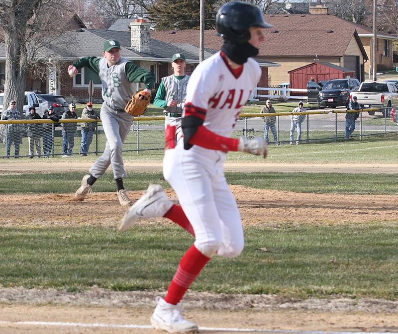 St. Bede's Alex Ankieicz throws out Hall's Max Bryant while running to first on Monday, March 27, 2023 at Kirby Park in Spring Valley.