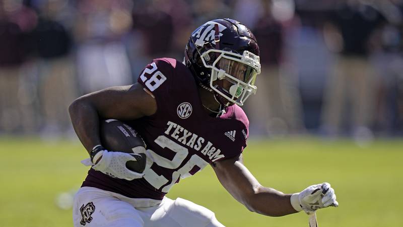 Texas A&M running back Isaiah Spiller rushes for a gain against Auburn on Nov. 6, 2021 in College Station, Texas.