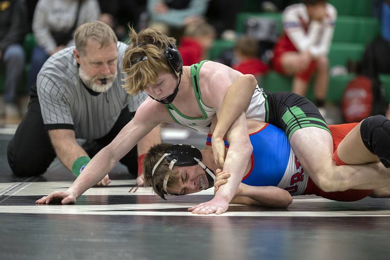 Rock Falls’ Aaron Meenen grapples with Oregon’s Preston LeBay at 120 pounds Thursday, Jan. 19, 2023 in Rock Falls. Meenen won by major decision.