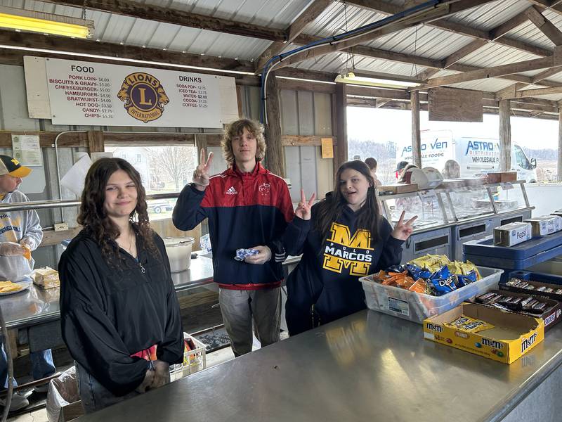 Polo FFA member Emma Dougherty and SVCC Impact students Kaeline Bellows-Davis and Collin Kendall volunteered at the Polo Lions Concession stand  on Saturday, April 5, 2025 at the Hazelhurst Spring Consignment Auction.