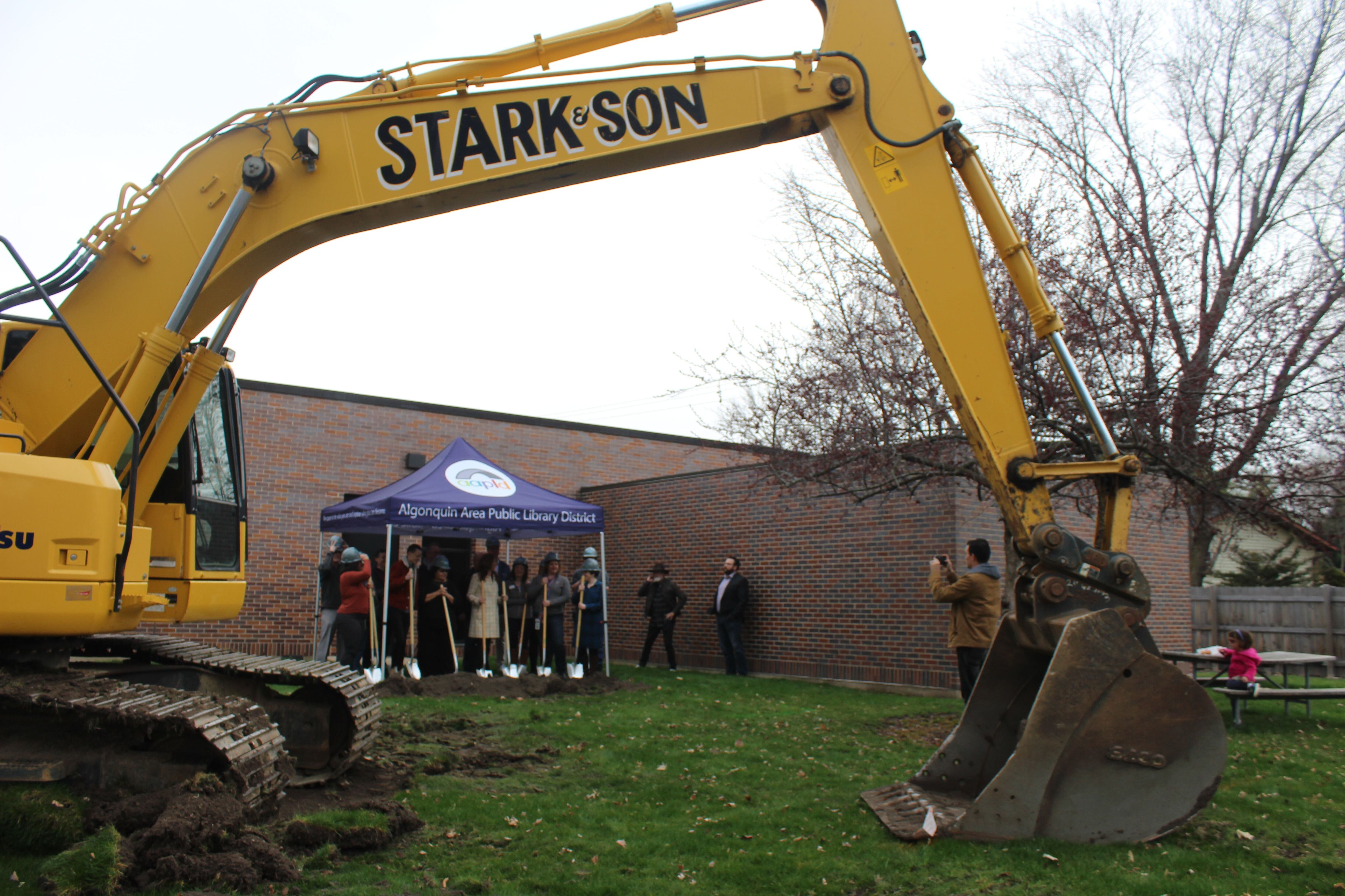 Algonquin Area Public Library staff and board members gather on Thursday, April 11, for a groundbreaking ceremony for renovations that start Monday.