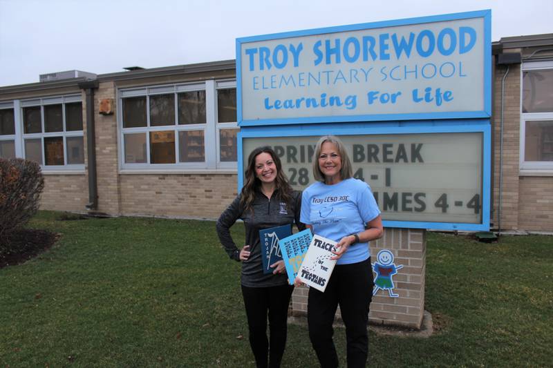 Kristi Kennedy, a 16-year teacher for Troy Community Consolidated School District 30-C (left), and Vicki Petrovic a 21-year year teacher for the district, both attending Shorewood Elementary School, which is celebrating its 70th anniversary. Kennedy currently teachers second grade at Shorewood Elementary and Petrovic teaches third. They both live in Shorewood, too.