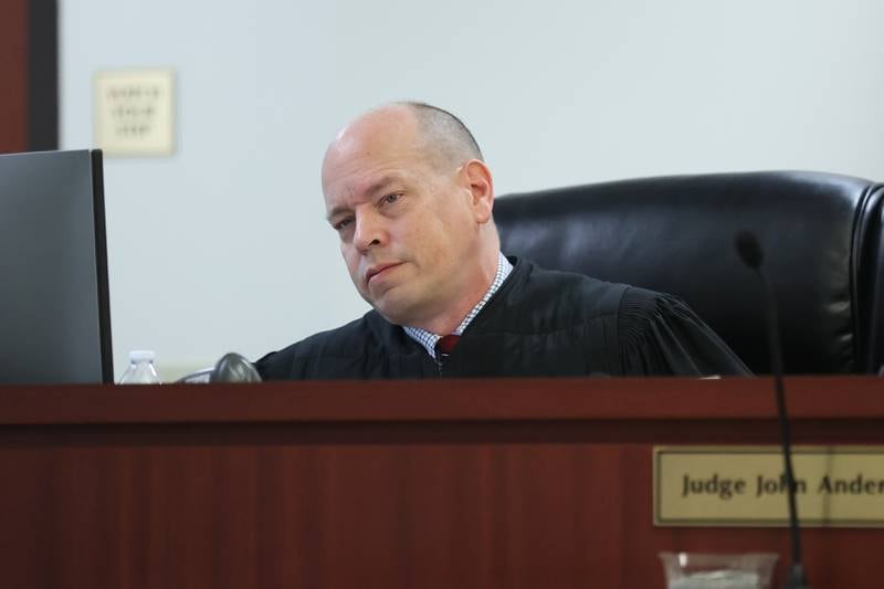 Judge John Anderson presides over the People v. Ferrell hearing at the Will County Annex building. Will County state’s attorneys are motioning to remove Joliet Township Trustee Karl Ferrell from the township board as they contend his past felony record disqualifies him from holding elected office. Tuesday, Mar. 30, 2022, in Joliet.
