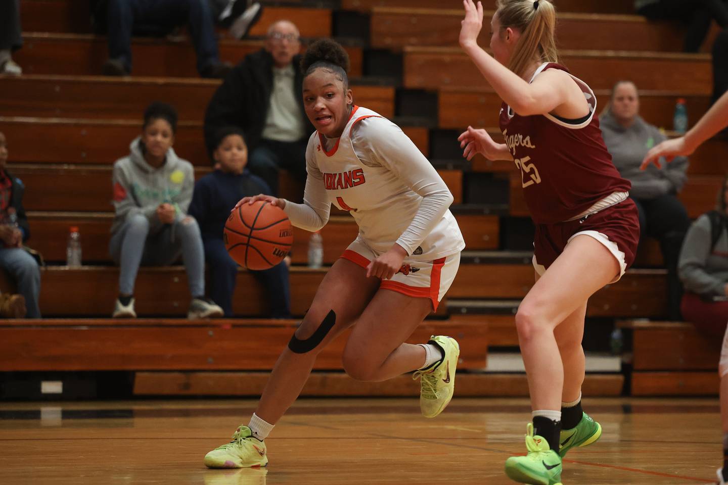 Minooka’s Makenzie Brass makes a move to the baseline against Plainfield North.