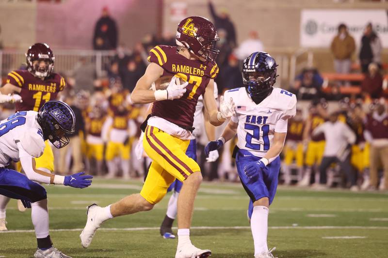 Loyola’s Brendan Loftus runs in for the score after a catch against Lincoln-Way East in the Class 8A championship on Saturday, Nov. 25, 2023 at Hancock Stadium in Normal.