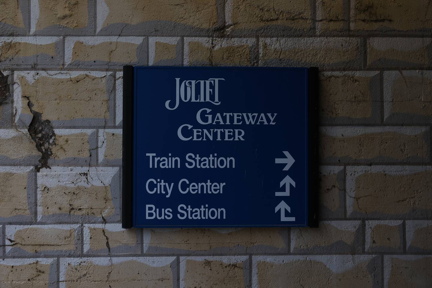 A sign directs pedestrians to the Joliet Gateway Center train and bus stations on Wednesday, Jan. 3rd, 2024 in Joliet.