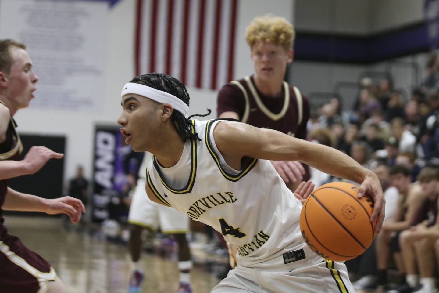 Yorkville Christian's Tray Alford (4) drives baseline during their Plano Christmas Classic basketball game between Morris at Yorkville Christian Friday, Dec 26, 2025 in Plano.