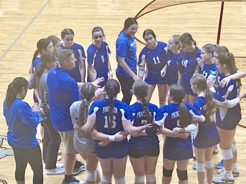 Princeton coach Andy Puck rallies the troops between sets of Tuesday's regional semifinals at Chillicothe. The Tigresses fell to El Paso-Gridley 25-17, 25-20.