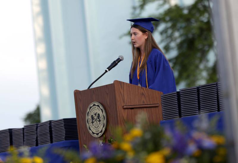 Lyons Township High School Class of 2023 President Madeline Grayson presents the class gift to the school during the school’s 2023 commencement ceremony in Western Springs on Wednesday, May 31, 2023.