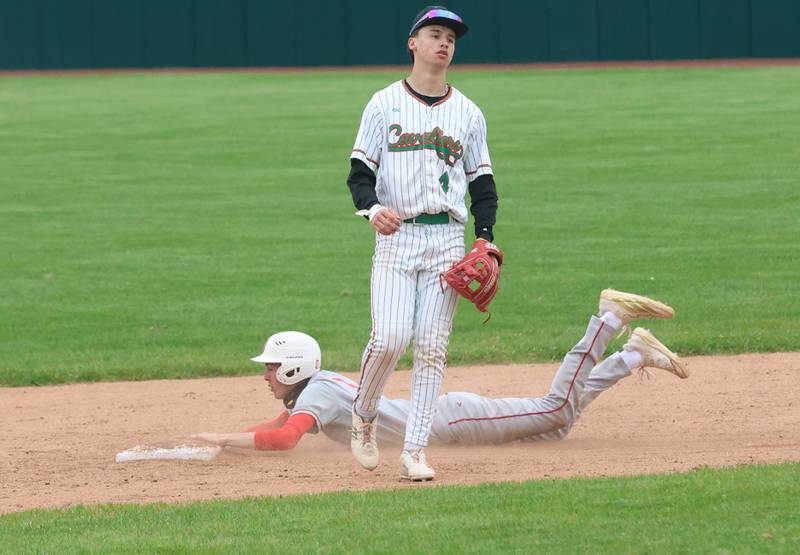 Ottawa's Colt Bryson steals second base as L-P's Jett Hill watches for the ball on Thursday, April 30, 2026 at Huby Sarver Field in the L-P Athletic Complex in La Salle.