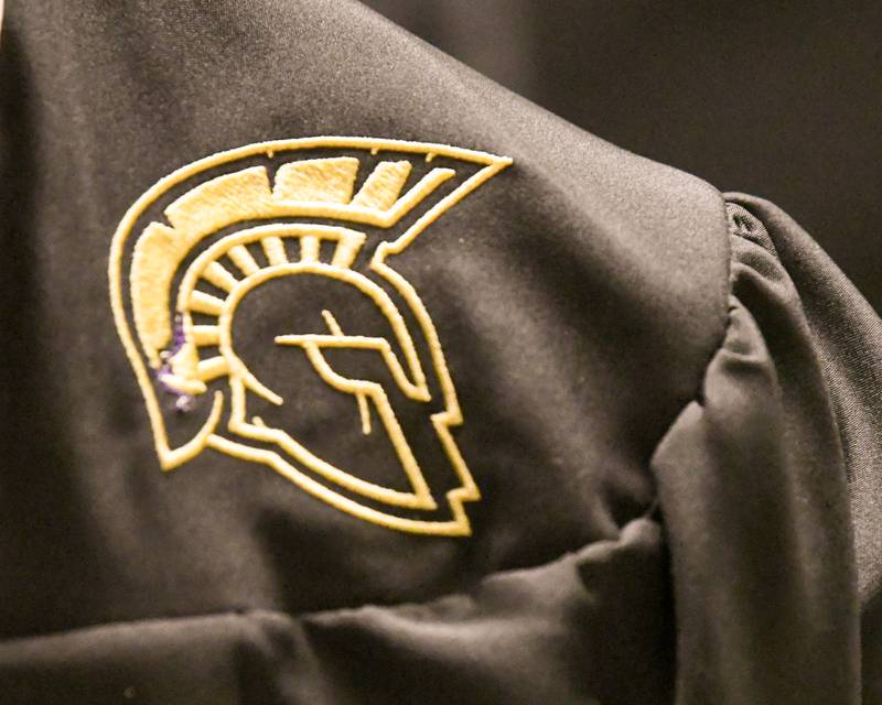 The logo of the spartan is embroidered into the gowns worn on graduation day on Sunday May 24, 2026, held at Sycamore High School.