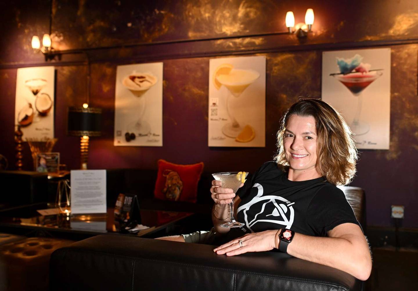 Ula Borodzinska, owner of Martini Room in Elgin, has operated the downtown bar for 20 years.
