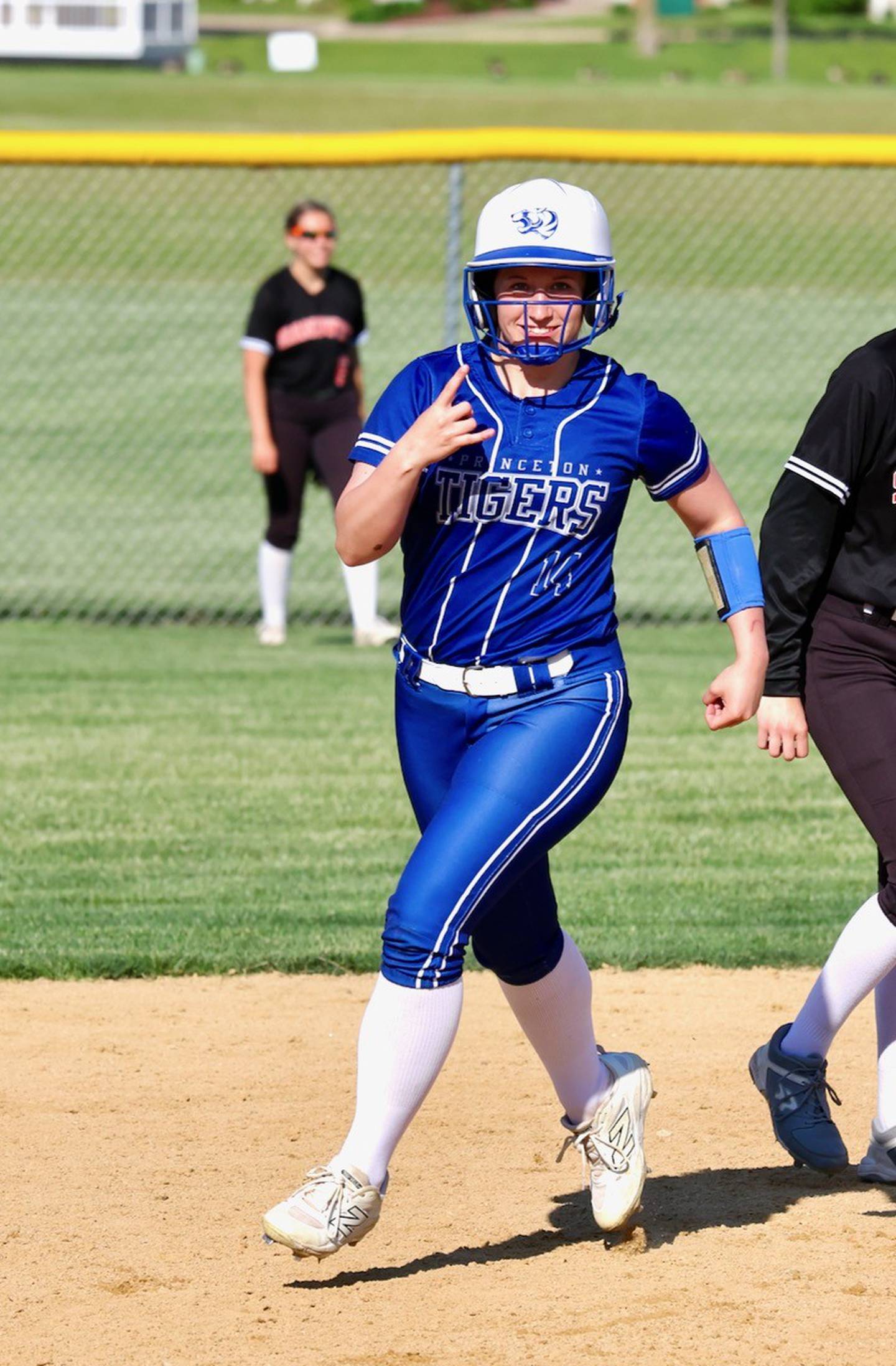 Princeton's Izzy Gibson rounds second after belting a home run in Friday''s regional semifinals at Prather Field. She hit two homers to power the Tigresses to a 9-6 win.