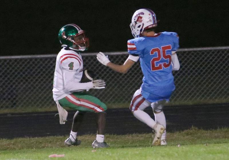 L-P's Cordell Wheatley scores a touchdown for L-P as Ottawa's Michael McGill arrives late to the play on Friday, Oct. 4, 2024 at King Field.