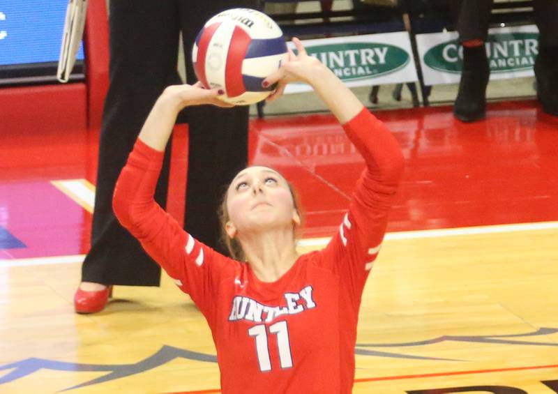 Huntley setter Rachel Hein pushes the ball in the air during the Class 4A State semifinal game on Friday, Nov. 15, 2024 at CEFCU Arena in Normal.