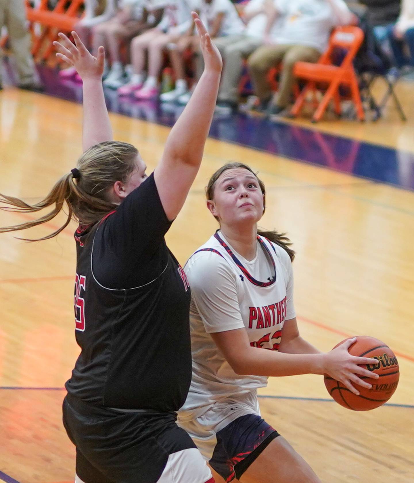 Oswego’s Kendall Grant (42) posts up against Yorkville's Madi Spychalski (35) during a basketball game at Oswego High School on Saturday, Jan 27, 2024.
