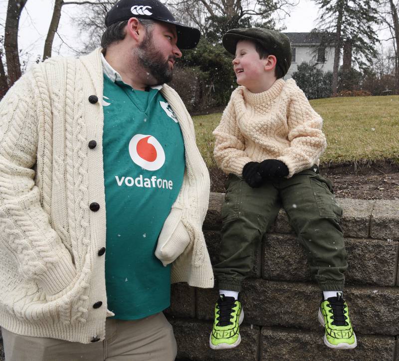 Paul Jennrich of Geneva and his son, Jack, 5, await the start of the St. Charles St. Patrick’s Parade Saturday, March 14, 2026.
