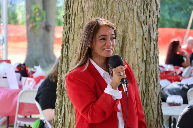 Divya Behl speaks on Oct. 4, 2025, at the engineering tent during NIU's Homecoming, when the inaugural College of Enginerring Hall of Fame class was announced.