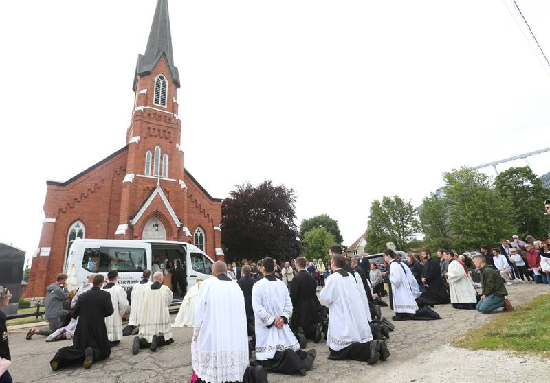 Bishop Louis Tylka leads the National Eucharistic Pilgrimage on Monday, May 19, 2025, at St. Mary's Catholic Church in Utica. The pilgrimage began in the Archdiocese of Indianapolis. It also made stops at Seneca's St. Patrick Church Queen of the Holy Rosary Shrine and St. Hyacinth Church.