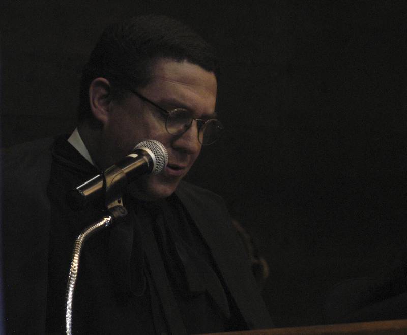 Reverend Thomas Doyle gives the invocation at Newman's graduation. The Newman High School Class of 2026 Commencement Ceremony was held on Wednesday, May 20, 2026, at Newman Central Catholic High School. in Sterling.