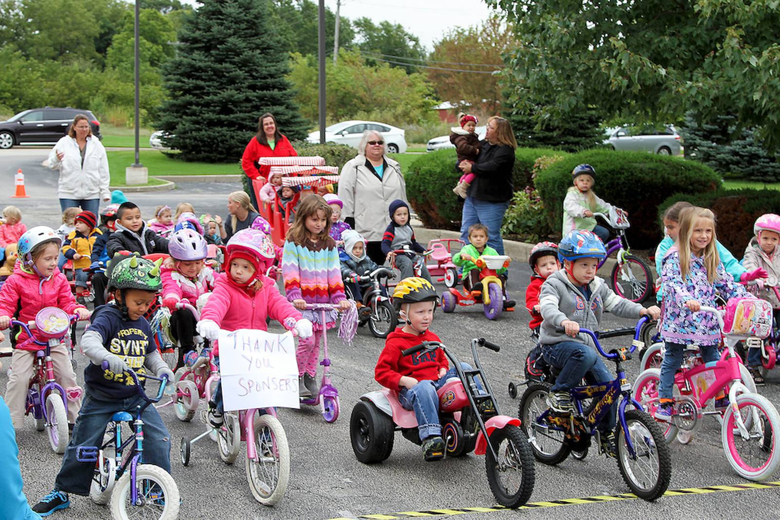 Genoa's Walnut Street Daycare Center children ride trikes, raise money
