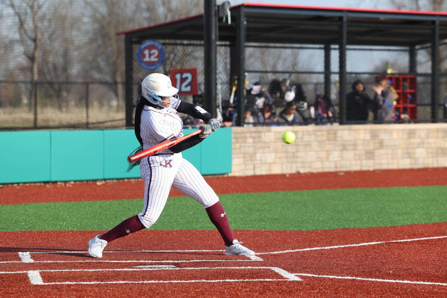 Kankakee's Madison Covington looks to connect with a pitch during the Kays 20-11 loss to Crete-Monee on Tuesday, April 7, 2026.