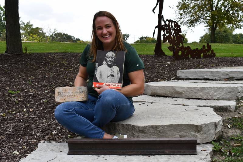 Amy Haller, an interpretive naturalist at Isle a la Cache Museum in Romeoville displays some of the artifacts that will be included in a “Stories of Steel” exhibit from Nov. 1 through Jan. 31 at the museum. The artifacts tell the tale of Joliet Iron Works, an iron manufacturing facility from 1880 to the 1930s that put Joliet on the map and drew workers from around the world.