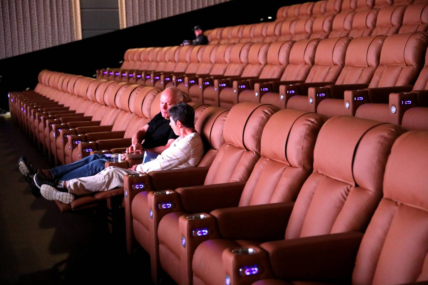 Gary and Jerri Barrows of Hoffman Estates sit for a showing of “Mission: Impossible – Dead Reckoning Part One” at the new Super EMX auditorium at the Emagine Batavia movie theatre on Tuesday, July 11, 2023.