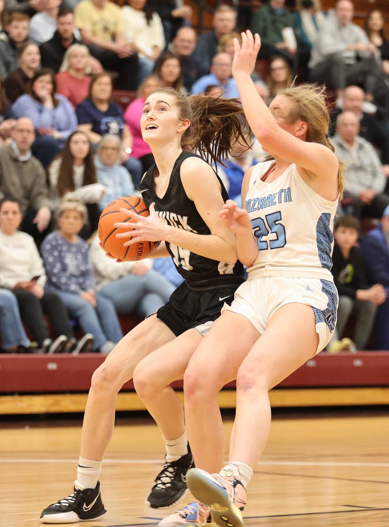 Fenwick goes to the basket during the girls 3A varsity super-sectional game between Nazareth Academy and Fenwick High School in River Forest on Monday, Feb. 27, 2023.