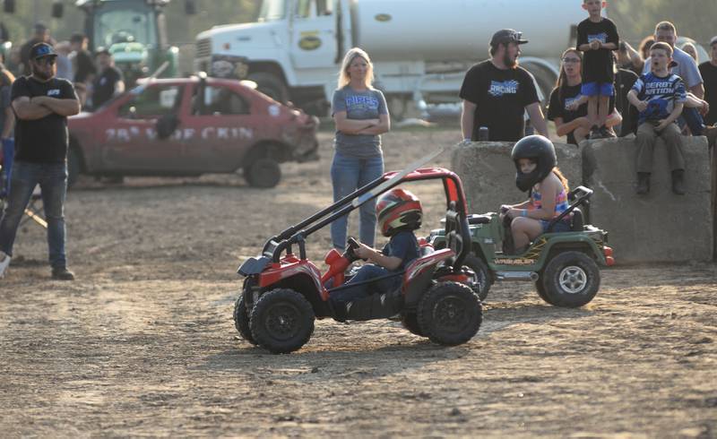 Cooper Sasso of Garden Prairie races to a first place finish in the kids power wagon sprint before the start of the demolition derby at the Ogle County Fair on Saturday, Aug. 2, 2025.