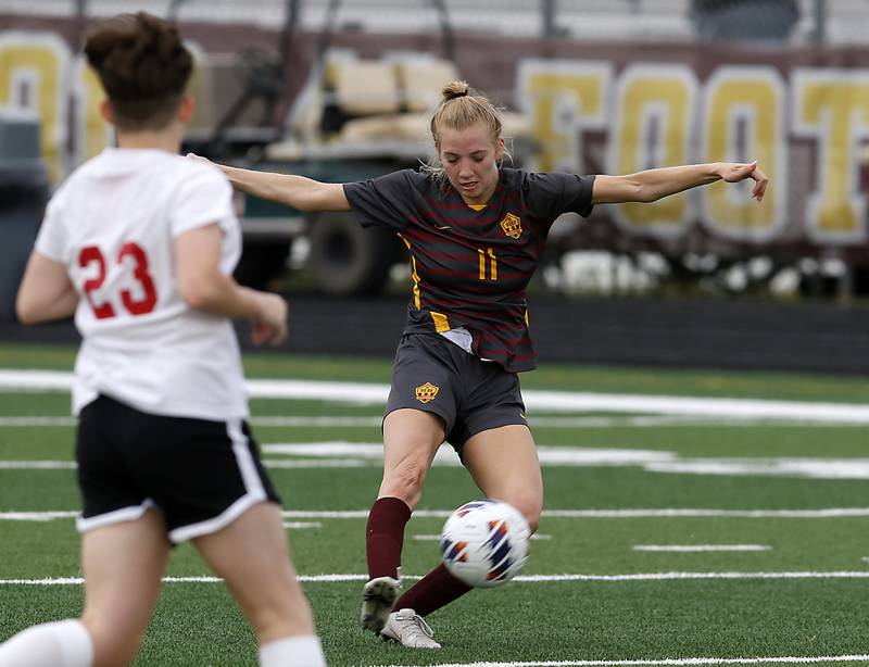 Richmond-Burton's Margaret Slove takes a shot on goal during a IHSA Division 1 Richmond-Burton Sectional semifinal soccer match against Woodlands Academy Tuesday, May 16, 2023, at Richmond-Burton High School.