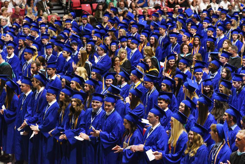 Geneva High School seniors applaude during their graduation ceremony on Tuesday, May 30, 2023 at Northern Illinois University in DeKalb.